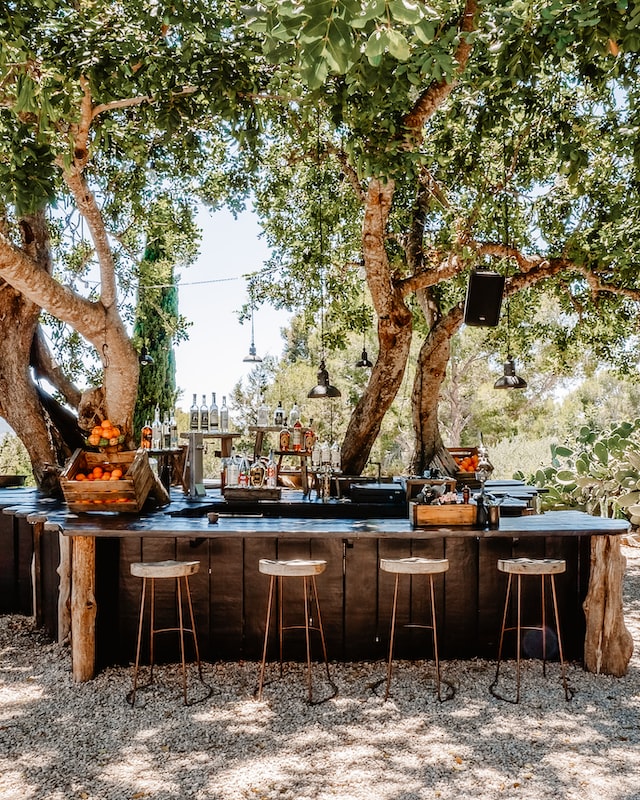 An outdoor kitchen under the trees